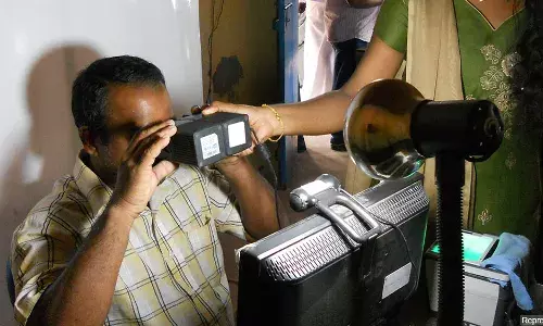 आधार का लाभ साफ नहीं: आरबीआई शोधकर्ता